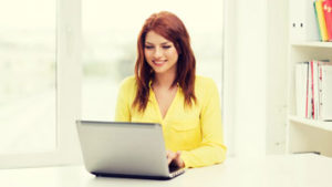 Learning Management System - Tandem HR - Young smiling woman